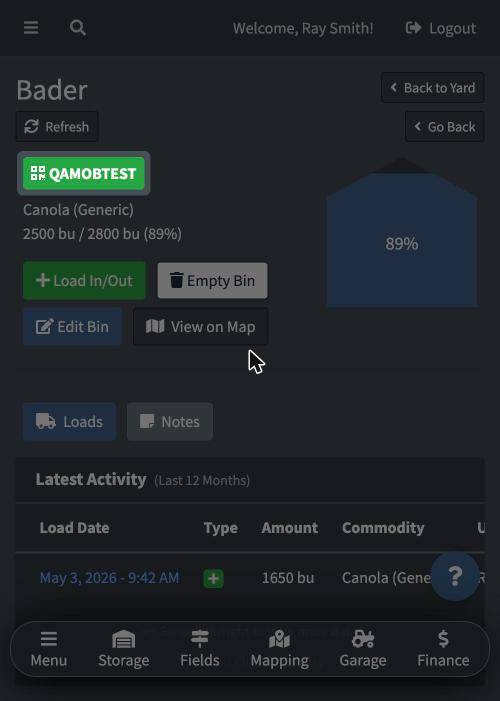 Bin page on a phone showing the linked QR tag's code as a badge